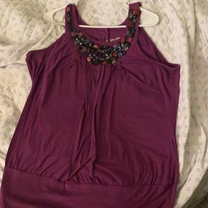 Loosely fit ruffle style tank top plum color with beaded neck line